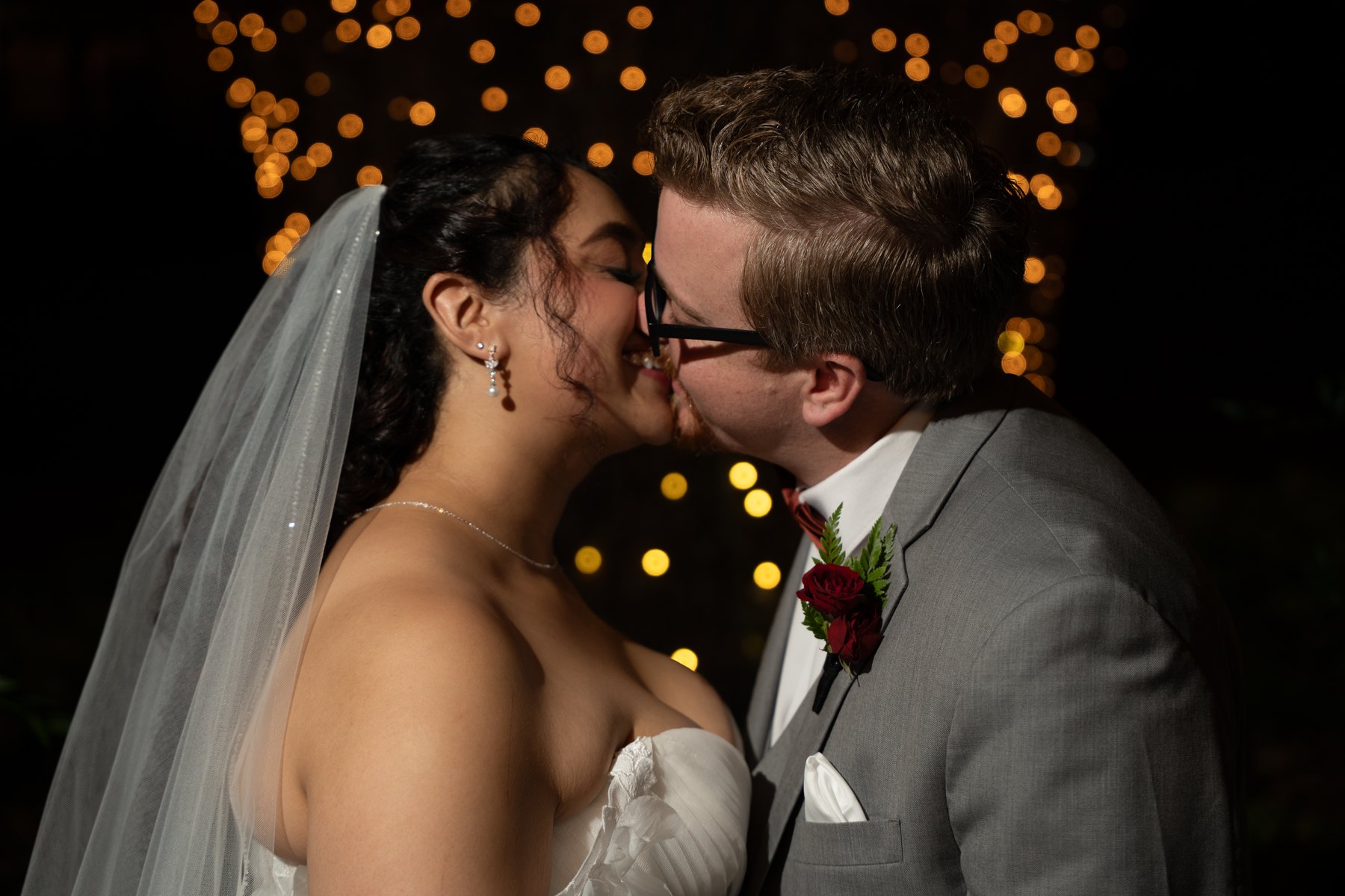 A couple shares a kiss